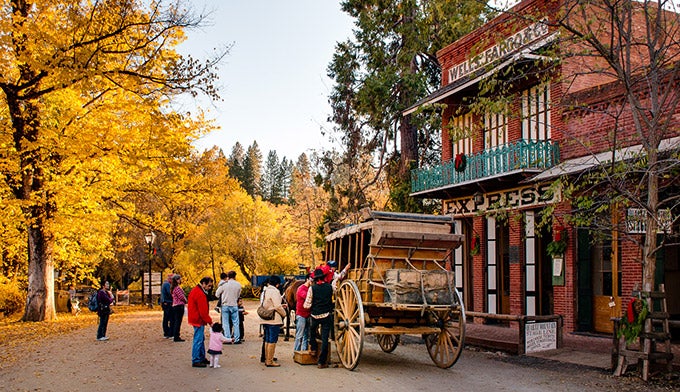 Columbia-StPark-Stagecoach_MichaelSharpsCourtesy_680 Vacationers board the stagecoach at Columbia State Park in California. Photo by Michael Sharps
