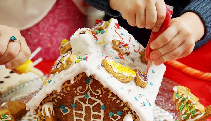Making-gingerbread-house_DP_680 Making holiday gingerbread houses.