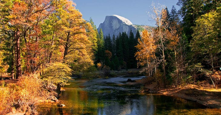 YO-HalfDome-Merced-autumn_DP_FB1200 Yosemite's Merced River bordered by autumn leaves and Half Dome