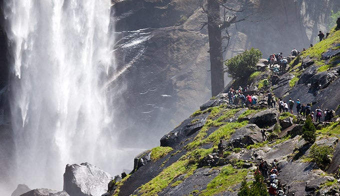 Mist-Trail-Vernal-crowd_Ordelheide_680 Hikers walk the Mist Trail beside Vernal Fall in Yosemite.