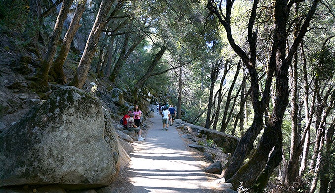 YT-Mist-Trail-Hikers_Gloria_680 Hikers enjoy a shady spot on the Mist Trail in Yosemite National Park.