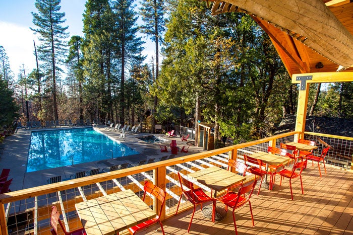 The Cedar Terrace overlooking the saltwater pool at Evergreen Lodge