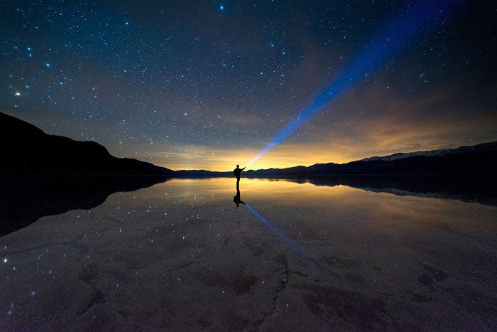 DeathValley-stars-flooded-BadwaterBasin_Tam19MoonKyong_700 The stars reflect over a flooded Badwater Basin in Death Valley National Park