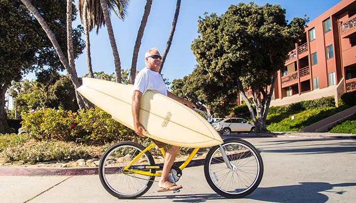 Ventura-bike-surfboard_VisitVentura_700 A surfboard bikers enjoying Ventura