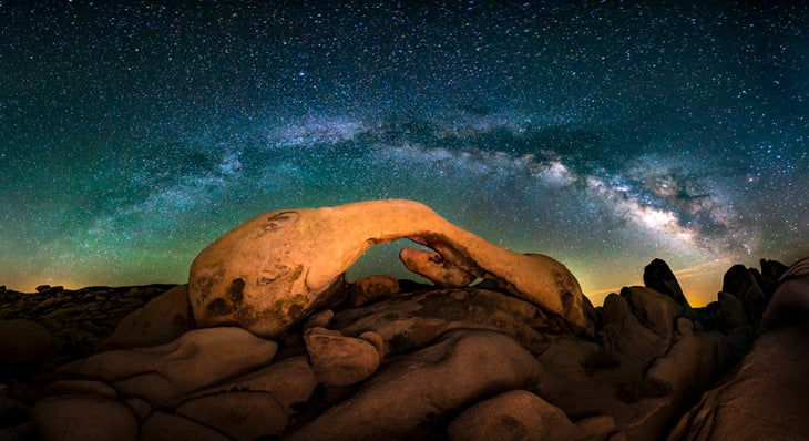 The Milky Way rises boldly over Arch Rock