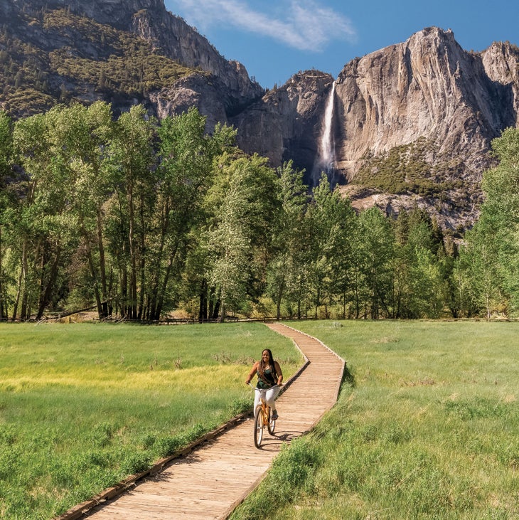 Kena Peay riding a bike through Yosemite Valley