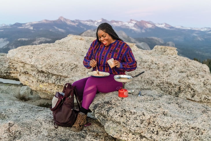 Kena Peay cooks up buffalo chicken crunch wraps in Yosemite National Park.