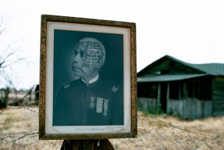 Portrait of Colonel Allensworth near an abandoned home in Colonel Allensworth State Historic Park
